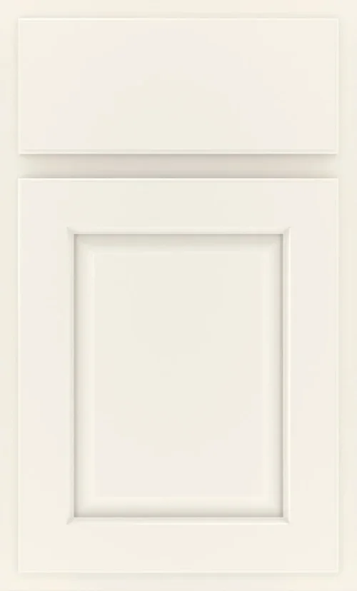 Cream colored painted shaker cabinet door highlighting subtle edge profiles.