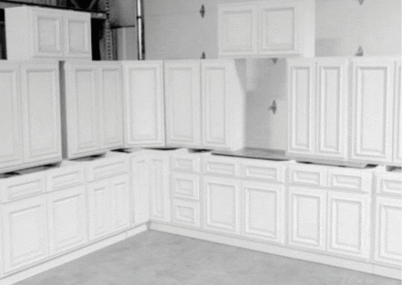 Traditional kitchen showroom area displaying an integrated island and wet bar.