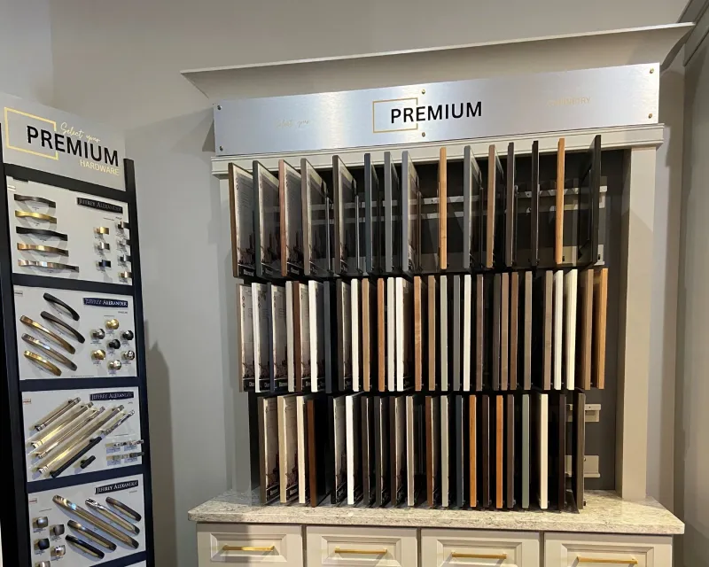 Showroom hardware display unit showcasing numerous cabinet door color profile options.