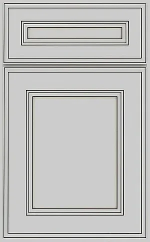 A close-up profile sample of a white cabinet door with decorative inner molding.
