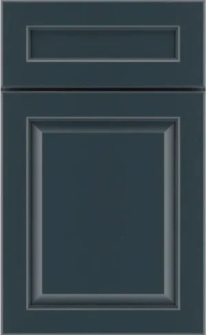 A close-up sample of a teal slate blue cabinet door with decorative grooved detailing.